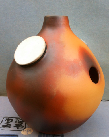 udu drum avec deux tambours